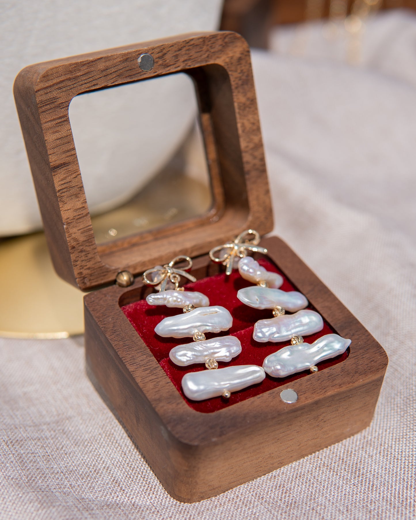 Boucles d’oreilles pendantes en perles, style nœud papillon