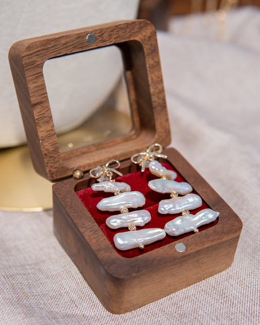 Boucles d’oreilles pendantes en perles, style nœud papillon