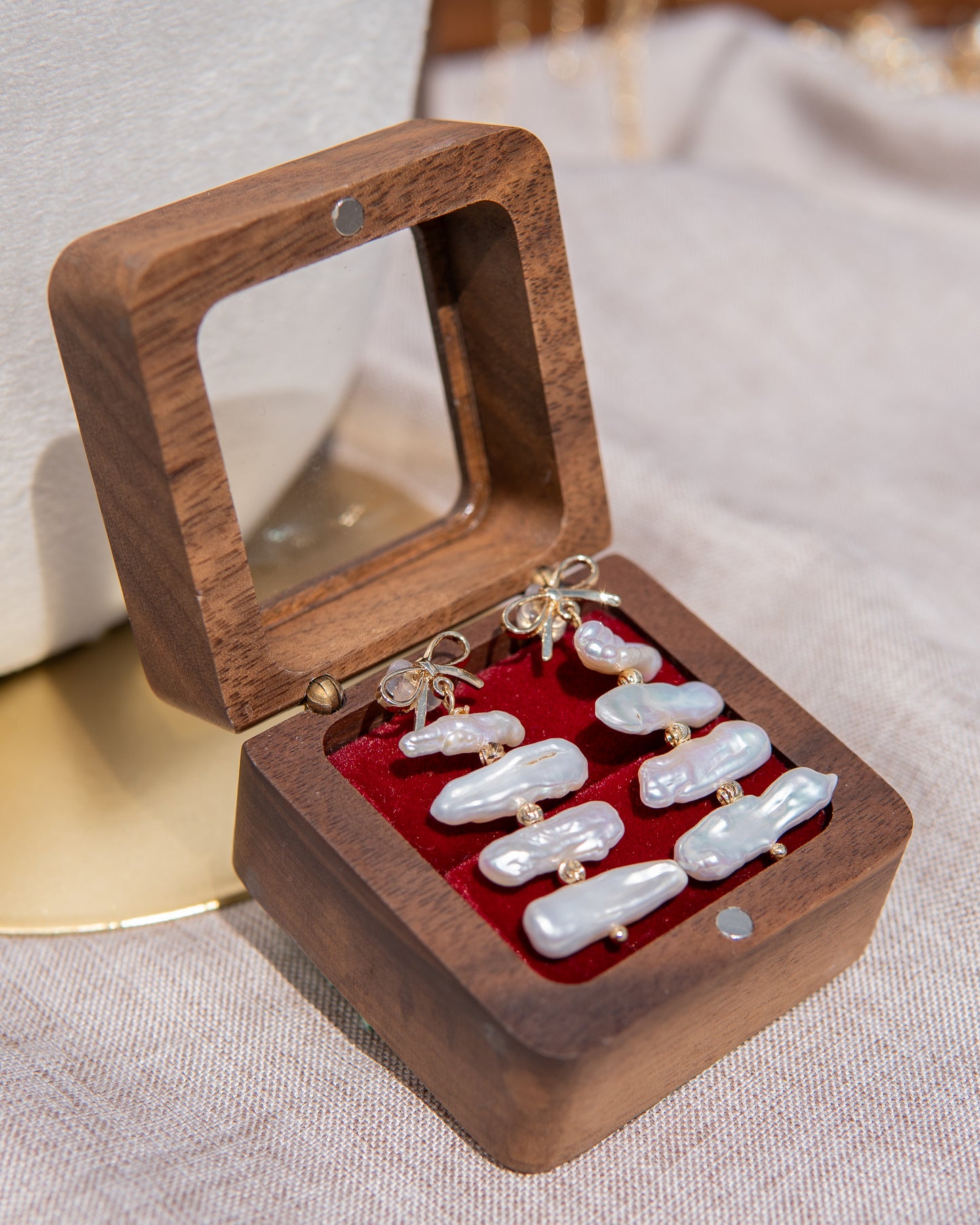 Boucles d’oreilles pendantes en perles, style nœud papillon