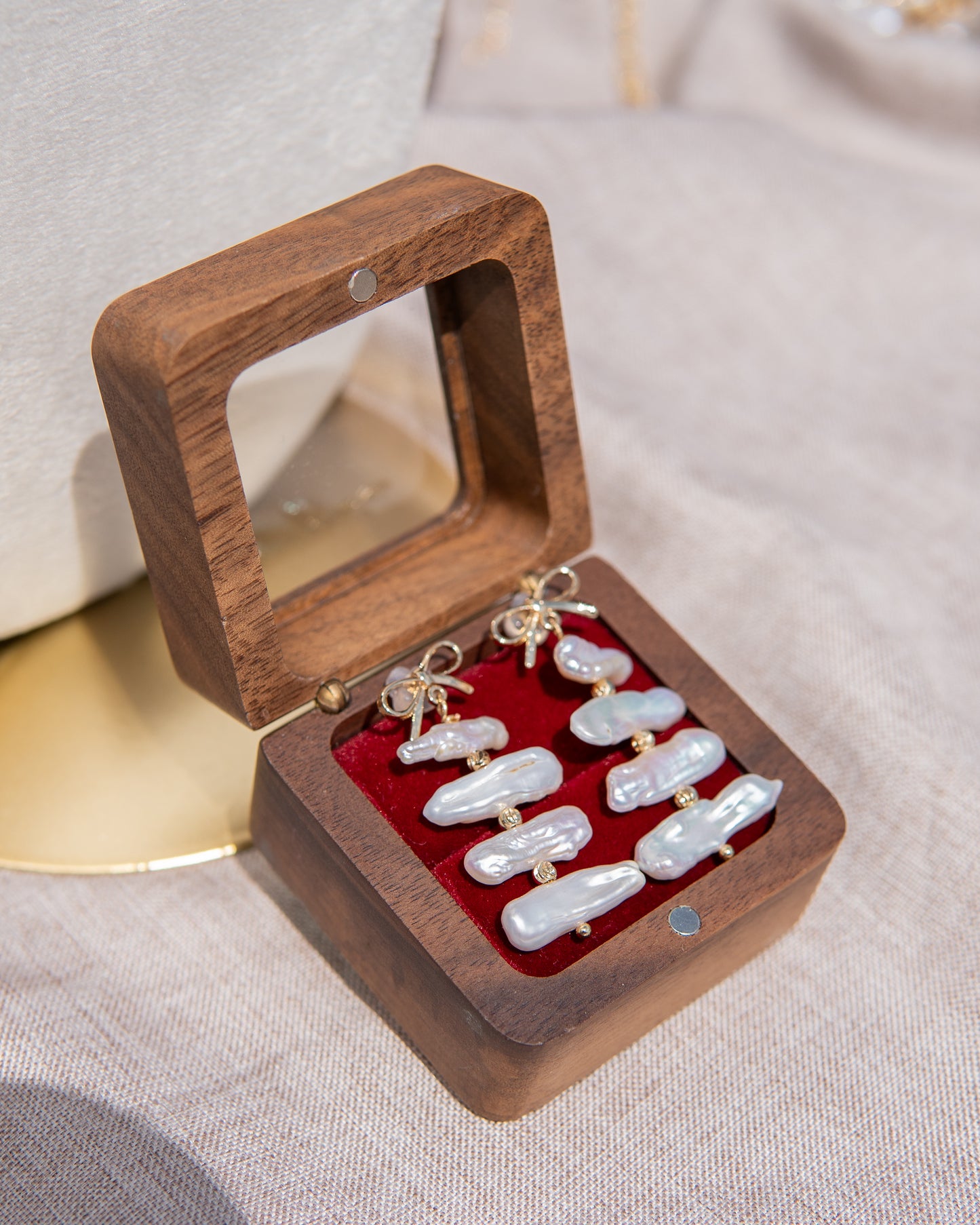 Boucles d’oreilles pendantes en perles, style nœud papillon