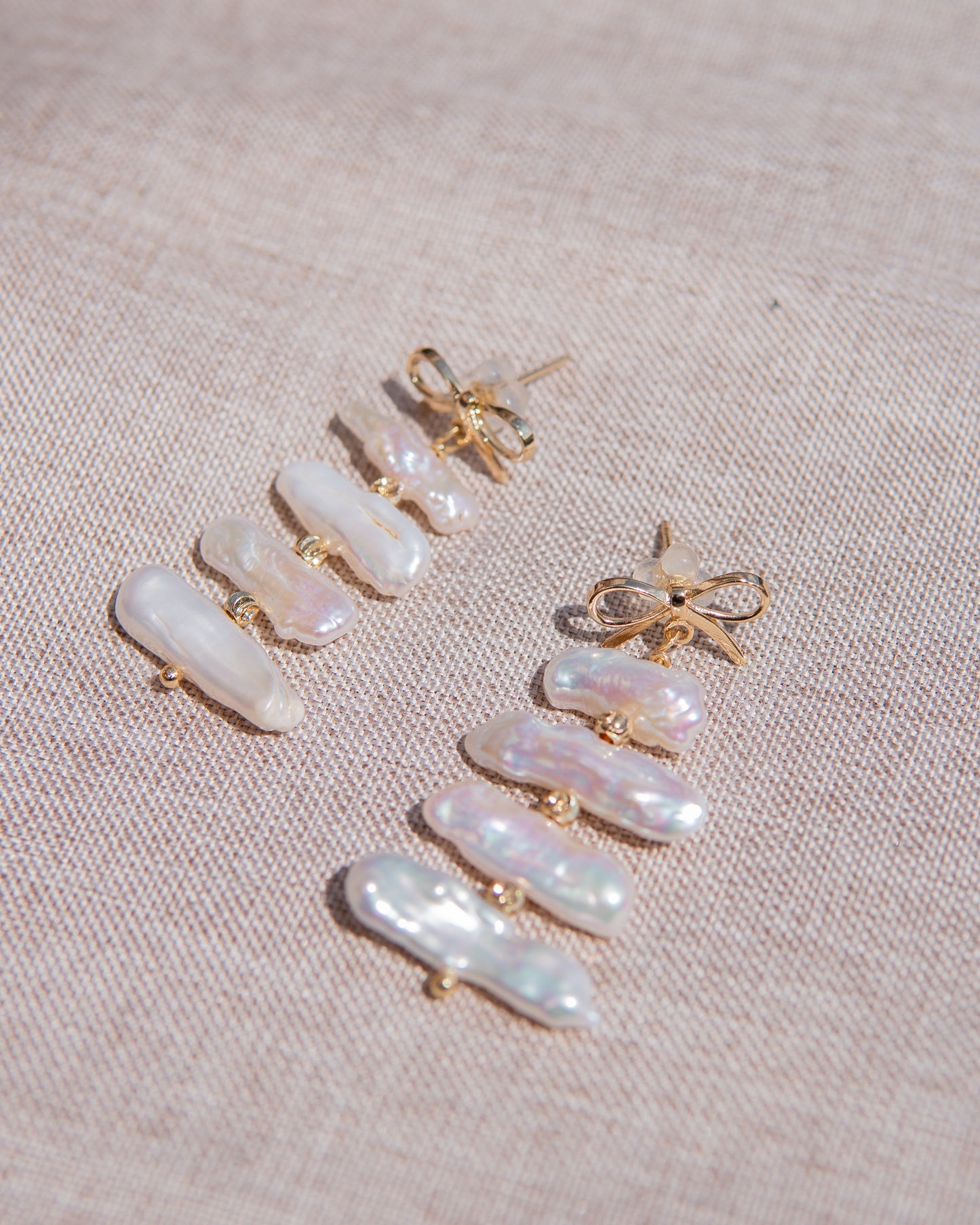 Boucles d’oreilles pendantes en perles, style nœud papillon